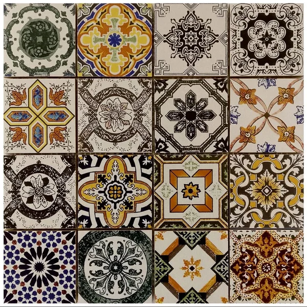 An expressive mix of floral and geometric tile patterns in blue, ochre and charcoal.
